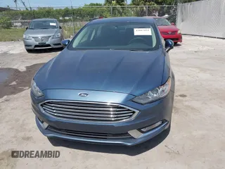 2018 Ford Fusion Hybrid SE with VIN 3FA6P0LU9JR137983, listed as a IAAI auction lot 42087894 with 196,330 mi miles. Bid and sale history available at carsss.com. Image 6.