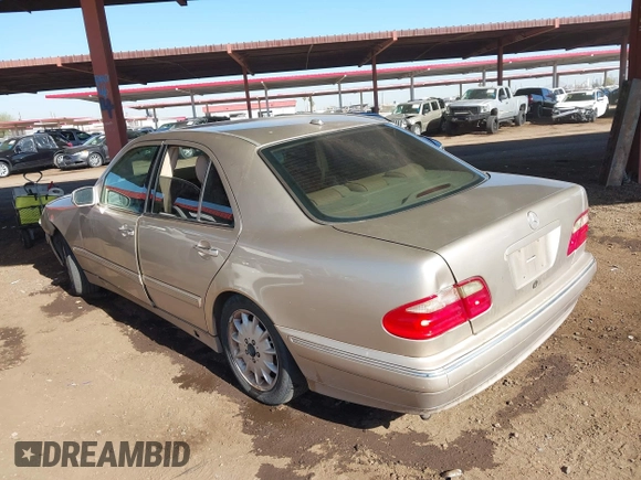 2001 Mercedes-Benz E-Class with VIN WDBJF65J11B232599, listed as a IAAI auction lot 41517879 with 173,366 mi miles. Bid and sale history available at carsss.com. Image 3.