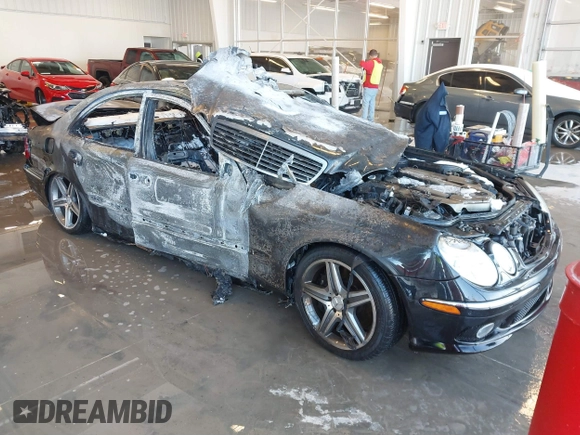 2003 Mercedes-Benz E-Class 5.5L AMG with VIN WDBUF76J73A327193, listed as a IAAI auction lot 41282703 with 1 mi miles. Bid and sale history available at carsss.com. Image 1.