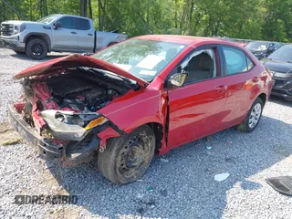 2015 Toyota Corolla L z VIN 2T1BURHE6FC384477, wystawiony jako IAAI lot #42418980 z przebiegiem 142 940 mil mil oraz . Historia ofert i sprzedaży dostępna na DreamBid. Obrazek 2.