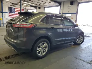 2019 Ford Edge SEL with VIN 2FMPK4J95KBB76844, listed as a Copart auction lot 59323925 with 122,326 mi miles and Salvage title. Bid and sale history available at DreamBid. Image 3.
