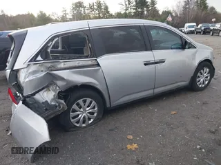 2011 Honda Odyssey LX with VIN 5FNRL5H29BB010256, listed as a IAAI auction lot 40931367 with Not provided miles and . Bid and sale history available at DreamBid. Image 13.