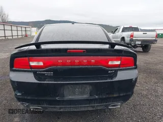 2014 Dodge Charger SXT with VIN 2C3CDXJG2EH243662, listed as a IAAI auction lot 41812674 with 114,108 mi miles. Bid and sale history available at carsss.com. Image 16.
