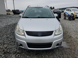 2009 Suzuki SX4 with VIN JS2YB413195101423, listed as a Copart auction lot 85321624 with 127,917 mi miles and Salvage Title. Bid and sale history available at carsss.com. Image 5.