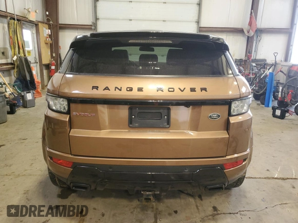 2014 Land Rover Range Rover Evoque Dynamic с VIN SALVT2BG6EH870050, выставлен на аукционе Copart как лот 42452995 с пробегом 126 143 миль миль и Списание • Salvage title. История ставок и продаж доступна на DreamBid. Изображение 6.