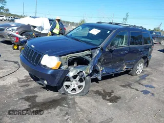 2009 Jeep Grand Cherokee Laredo with VIN 1J8HR48P19C540785, listed as a IAAI auction lot 41729851 with 205,504 mi miles. Bid and sale history available at carsss.com. Image 17.