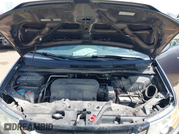 2015 Honda Odyssey EX-L with VIN 5FNRL5H68FB066570, listed as a IAAI auction lot 42092446 with 104,523 mi miles and . Bid and sale history available at DreamBid. Image 10.