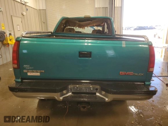 1993 GMC Sierra 1500 z VIN 2GTEK19K8P1562964, wystawiony jako Copart lot #86767744 z przebiegiem 237 615 mil mil oraz Czysty tytuł • Clean title. Historia ofert i sprzedaży dostępna na DreamBid. Obrazek 6.