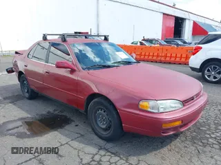 1995 Toyota Camry LE z VIN JT2SK12E2S0310809, wystawiony jako IAAI lot #40214382 z przebiegiem 316 368 mil mil oraz . Historia ofert i sprzedaży dostępna na DreamBid. Obrazek 1.