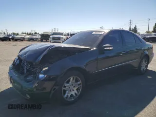 2003 Mercedes-Benz E-Class 3.2L with VIN WDBUF65J23A108105, listed as a Copart auction lot 79939884 with 238,172 mi miles and Salvage Title. Bid and sale history available at carsss.com. Image 1.