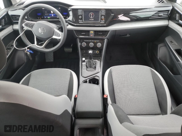 2023 Volkswagen Taos S с VIN 3VVCX7B24PM305607, выставлен на аукционе Copart как лот 51692665 с пробегом 16 871 миль миль и Списание • Salvage title. История ставок и продаж доступна на DreamBid. Изображение 8.