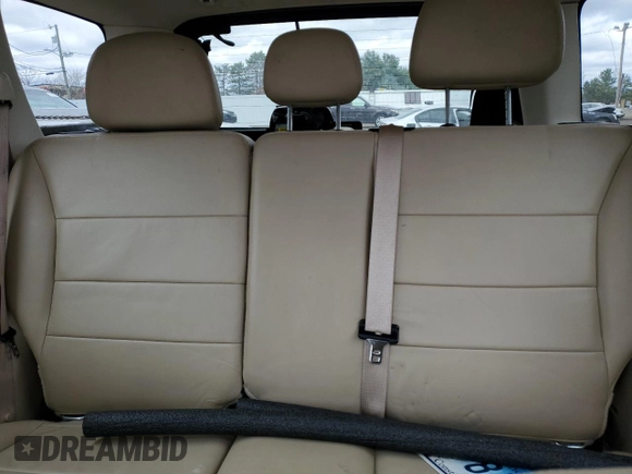 2011 Ford Escape Limited with VIN 1FMCU9EGXBKB51054, listed as a Copart auction lot 53447125 with 133,342 mi miles and Salvage Title. Bid and sale history available at DreamBid. Image 10.
