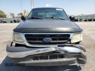 2003 Ford F-150 XLT with VIN 1FTRW07663KA63497, listed as a Copart auction lot 51658115 with 269,633 mi miles and Salvage Title. Bid and sale history available at carsss.com. Image 5.