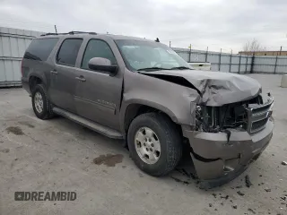 2011 Chevrolet Suburban LT with VIN 1GNSKJE36BR333157, listed as a Copart auction lot 50196875 with 147,448 mi miles and Salvage Title. Bid and sale history available at carsss.com. Image 4.