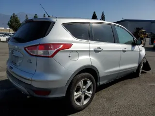 2013 Ford Escape SE with VIN 1FMCU9G91DUA14350, listed as a Copart auction lot 63651315 with 165,414 mi miles and Salvage title. Bid and sale history available at DreamBid. Image 3.