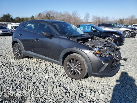 2018 Mazda CX-3 Touring with VIN JM1DKFC7XJ0332519, listed as a Copart auction lot 87897575 with 66,520 mi miles and Salvage Title. Bid and sale history available at carsss.com. Image 4.