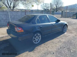 1997 Honda Civic LX with VIN 2HGEJ6670VH567081, listed as a IAAI auction lot 41995007 with 107,943 mi miles. Bid and sale history available at carsss.com. Image 4.