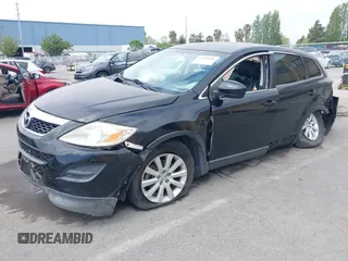 2010 Mazda CX-9 Grand Touring with VIN JM3TB2MV1A0203416, listed as a IAAI auction lot 42090500 with 131,659 mi miles and . Bid and sale history available at carsss.com. Image 2.