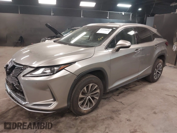 2021 Lexus RX with VIN 2T2HZMDA7MC292353, listed as a IAAI auction lot 41320034 with 29,571 mi miles. Bid and sale history available at carsss.com. Image 2.