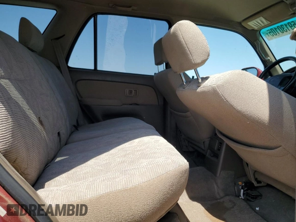 2000 Toyota 4Runner SR5 z VIN JT3GN86RXY0154204, wystawiony jako Copart lot #59130105 z przebiegiem 195 446 mil mil oraz Czysty tytuł • Clean title. Historia ofert i sprzedaży dostępna na DreamBid. Obrazek 11.