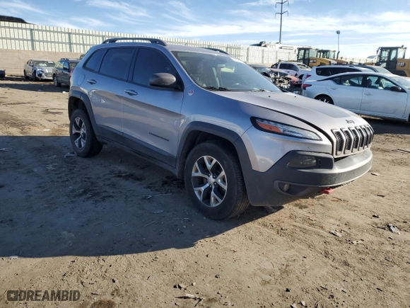 2018 Jeep Cherokee Trailhawk with VIN 1C4PJMBB9JD571773, listed as a Copart auction lot 82876514 with 137,565 mi miles and Salvage Title. Bid and sale history available at carsss.com. Image 4.