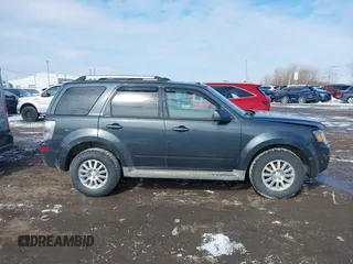 2010 Mercury Mariner Premier with VIN 4M2CN9HG6AKJ27176, listed as a IAAI auction lot 41607396 with 131,213 mi miles and . Bid and sale history available at DreamBid. Image 13.