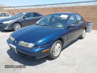 1998 Saturn SL z VIN 1G8ZK5270WZ174447, wystawiony jako IAAI lot #42543578 z przebiegiem 137 326 mil mil oraz . Historia ofert i sprzedaży dostępna na DreamBid. Obrazek 2.