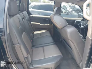 2006 Honda Ridgeline RTL with VIN 2HJYK16576H566002, listed as a IAAI auction lot 42595698 with 212,637 mi miles and . Bid and sale history available at DreamBid. Image 8.
