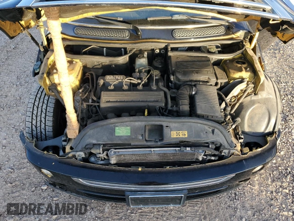 2007 MINI Convertible with VIN WMWRF33597TG16707, listed as a Copart auction lot 79104014 with 113,380 mi miles and Salvage Title. Bid and sale history available at DreamBid. Image 11.