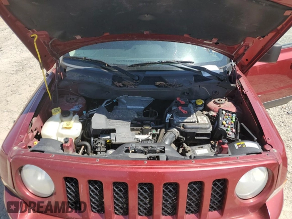 2014 Jeep Patriot Latitude with VIN 1C4NJRFB3ED792919, listed as a Copart auction lot 66043945 with 142,224 mi miles and Salvage title. Bid and sale history available at DreamBid. Image 12.