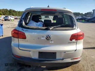 2014 Volkswagen Tiguan SE with VIN WVGAV3AX9EW611860, listed as a Copart auction lot 74431754 with 116,022 mi miles and Salvage title. Bid and sale history available at DreamBid. Image 6.