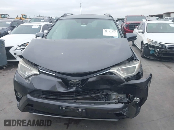 2018 Toyota RAV4 XLE with VIN 2T3WFREV1JW512476, listed as a IAAI auction lot 42177733 with 132,207 mi miles and . Bid and sale history available at DreamBid. Image 12.