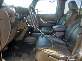 2016 Jeep Wrangler Unlimited Sahara with VIN 1C4HJWEG9GL103631, listed as a Copart auction lot 60530885 with 232,683 mi miles and Salvage title. Bid and sale history available at DreamBid. Image 7.
