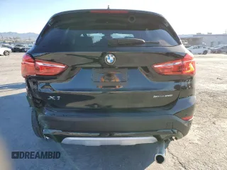 2021 BMW X1 sDrive28i with VIN WBXJG7C03M5T10112, listed as a Copart auction lot 49386695 with 46,869 mi miles and Salvage Title. Bid and sale history available at DreamBid. Image 6.