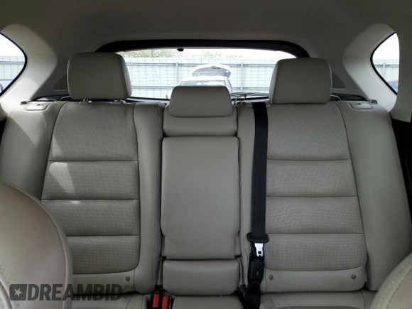 2014 Mazda CX-5 Grand Touring with VIN JM3KE4DY3E0304908, listed as a Copart auction lot 53873655 with 144,382 mi miles and Salvage Title. Bid and sale history available at DreamBid. Image 10.