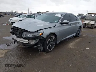 2019 Honda Accord Sport with VIN 1HGCV1F38KA030061, listed as a IAAI auction lot 41712893 with Not Provided miles and . Bid and sale history available at carsss.com. Image 2.