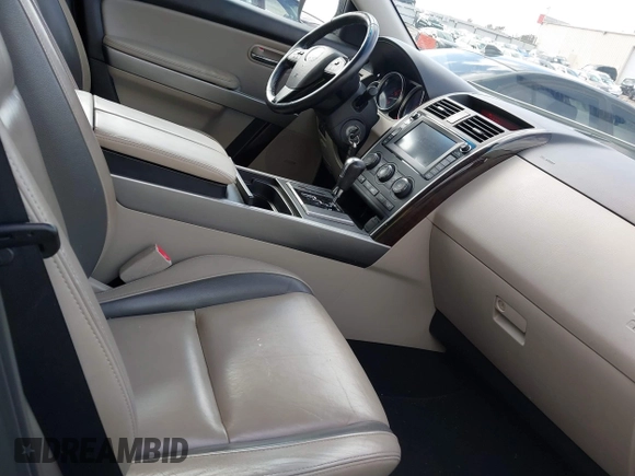 2011 Mazda CX-9 Grand Touring with VIN JM3TB2DA8B0301776, listed as a IAAI auction lot 41582526 with 233,661 mi miles. Bid and sale history available at carsss.com. Image 5.