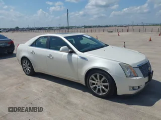 2009 Cadillac CTS AWD z VIN 1G6DS57V690103191, wystawiony jako IAAI lot #42418891 z przebiegiem 151 562 mil mil oraz . Historia ofert i sprzedaży dostępna na DreamBid. Obrazek 1.