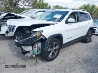 2019 Jeep Cherokee Limited z VIN 1C4PJMDN6KD151073, wystawiony jako IAAI lot #41572426 z przebiegiem 101 316 mil mil oraz . Historia ofert i sprzedaży dostępna na DreamBid. Obrazek 2.
