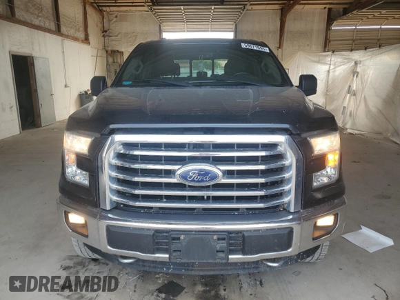 2015 Ford F-150 XLT with VIN 1FTEW1EF0FFA69722, listed as a Copart auction lot 59671695 with 189,690 mi miles and Salvage title. Bid and sale history available at DreamBid. Image 5.