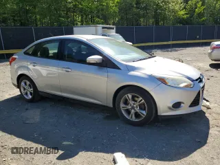 2013 Ford Focus SE with VIN 1FADP3F27DL207986, listed as a Copart auction lot 54608055 with 128,081 mi miles and Salvage title. Bid and sale history available at DreamBid. Image 4.