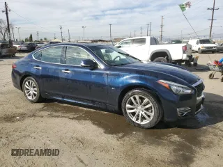 2015 Infiniti Q70 z VIN JN1BY1AP6FM541710, wystawiony jako Copart lot #47126225 z przebiegiem 57 304 mil mil oraz Szkoda całkowita • Salvage title. Historia ofert i sprzedaży dostępna na DreamBid. Obrazek 4.