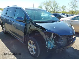 2014 Toyota Sienna LE AAS with VIN 5TDKK3DC4ES464647, listed as a IAAI auction lot 42132627 with 130,724 mi miles and . Bid and sale history available at DreamBid. Image 1.
