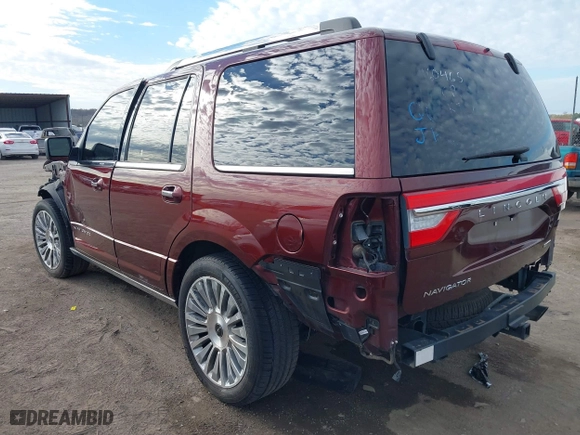 2015 Lincoln Navigator with VIN 5LMJJ2JT4FEJ12021, listed as a IAAI auction lot 41880471 with 104,979 mi miles. Bid and sale history available at carsss.com. Image 3.