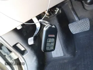 2018 Honda Pilot Touring with VIN 5FNYF6H95JB019122, listed as a IAAI auction lot 42439283 with 128,848 mi miles and . Bid and sale history available at DreamBid. Image 11.
