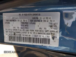 2014 Mazda 2 Sport with VIN JM1DE1KY0E0181555, listed as a IAAI auction lot 41539841 with 121,918 mi miles and . Bid and sale history available at DreamBid. Image 9.