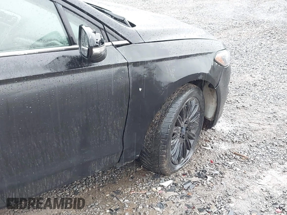 2015 Ford Fusion SE Hybrid with VIN 3FA6P0LU4FR236282, listed as a IAAI auction lot 42006659 with 146,931 mi miles and . Bid and sale history available at DreamBid. Image 12.