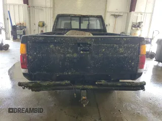 1986 Nissan Hardbody E z VIN 1N6ND16Y7GC413942, wystawiony jako Copart lot #57677605 z przebiegiem 126 183 mil mil oraz Tytuł czysty. Historia ofert i sprzedaży dostępna na DreamBid. Obrazek 6.