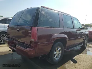 1999 GMC Denali with VIN 1GKEK13RXXR910328, listed as a Copart auction lot 71494384 with 251,016 mi miles and Salvage Title. Bid and sale history available at carsss.com. Image 3.