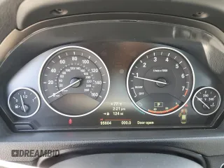 2014 BMW 3 Series 320i with VIN WBA3B1C55EK133687, listed as a Copart auction lot 63049945 with 95,604 mi miles and Salvage title. Bid and sale history available at DreamBid. Image 9.